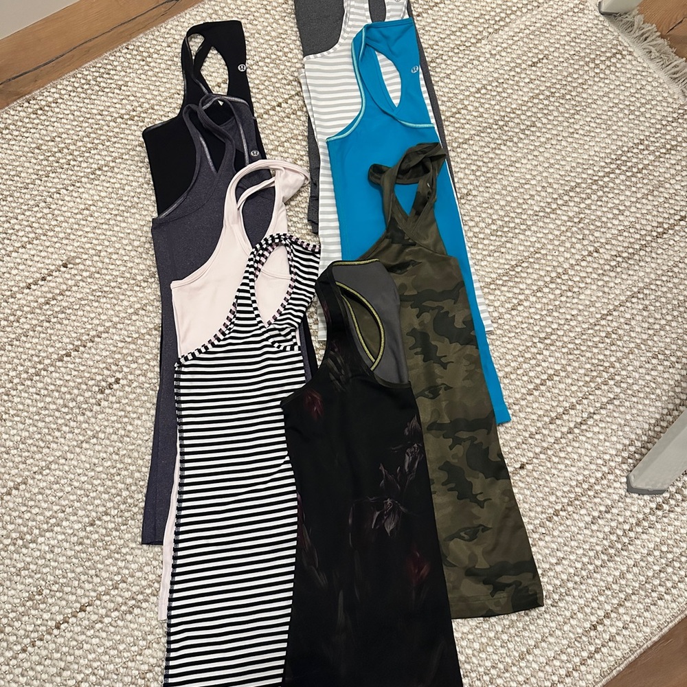 One Lot of 9 Assorted Women's lululemon Tank Tops between M and L